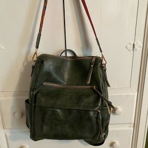 Dark green backpack purchased from an online boutique.